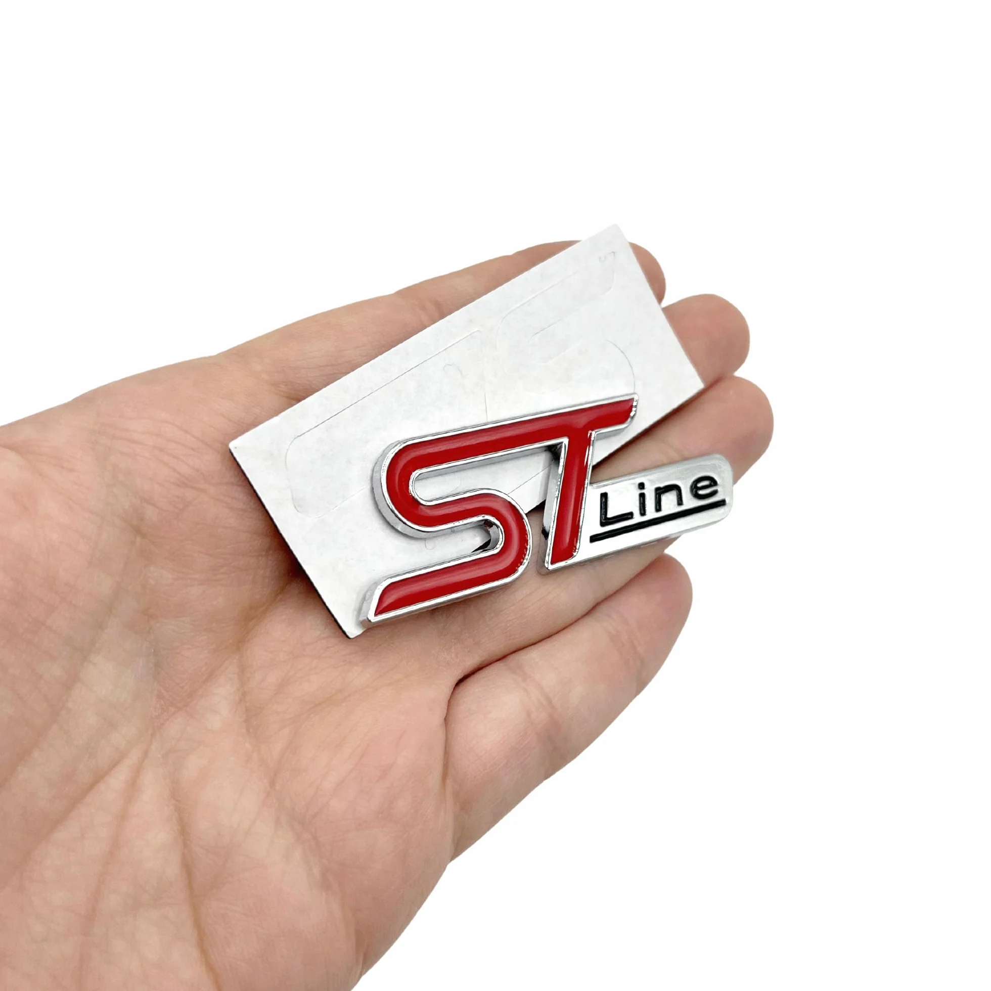 AUTOZOCO Adesivo ST Line, stemma ST, adatto per laterali, compatibile con Ford, materiale metallico, 6 cm larghezza x 2,1 cm altezza, argento